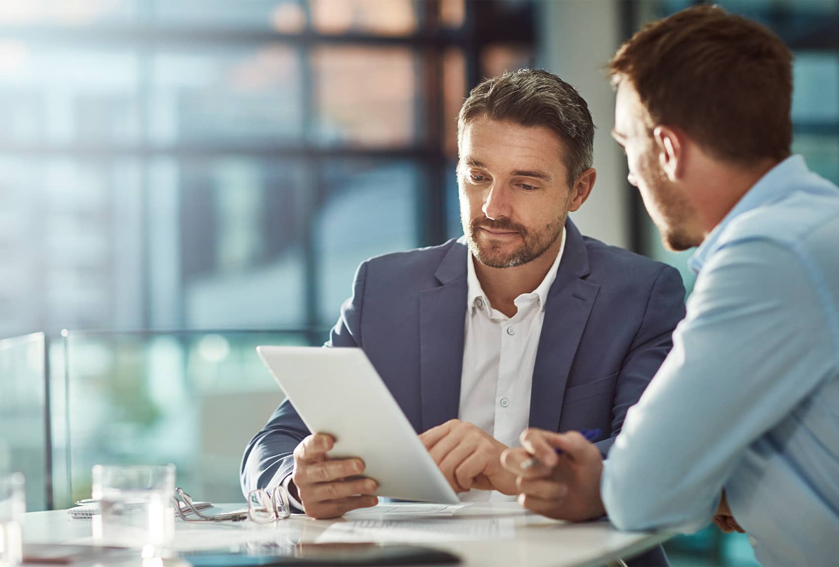 professional delivering results to another person